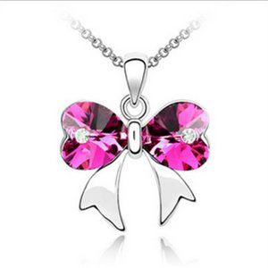 CLEARANCE ** PRICE FIRM  ** Silver Pink CZ Bow Pendant Necklace